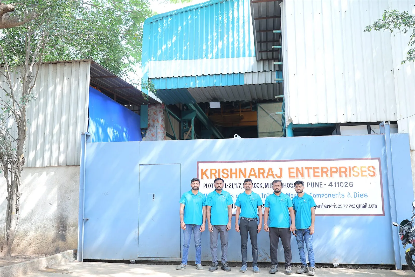 The Krishnaraj Enterprises team at the entrance to our manufacturing facility